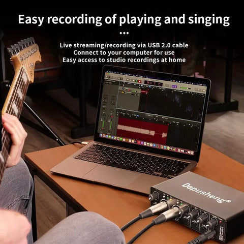 Person playing guitar with Plug And Play USB Audio Interface For Home Studio With Two Mic Preamps, 48V Phantom Power, connected to laptop