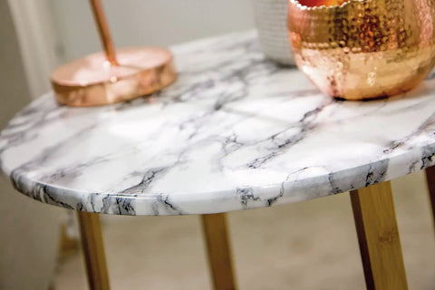 Close-up of furniture surface covered with Marble White Self Adhesive Film Roll For Walls Cabinets And Furniture Peel And Stick DIY Home Decor Transform Surfaces Quickly 17 By 78 Inch Roll Ideal For DIY Projects And Quick Room Updates.