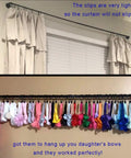 Sturdy 20 Pack Metal Curtain Ring Clips Set For Drapes 1.5 Inch Inner Diameter Black No Slip Clip Rings holding curtains and bows.