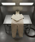 Canvas Sandblasting Suit With Hood Full Body Dustproof Workwear For Grinding And Sanding In Factory Workshops Hardcore Protection And Comfortable Fit Durable Grit Proof Coverall For Maintenance Jobs beige hooded coverall on worktable