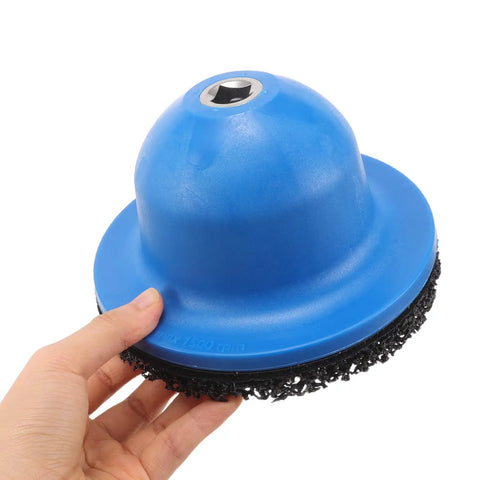 Get That Wheel Hub Looking Fresh With Heavy Duty Wire Brush Grinding Discs And Silicon Carbide Polishing Wheels For Serious Car Detailing And Metal Surface Restoration Efforts, blue grinding disc in hand.