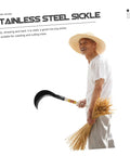 Man holding Multipurpose Long Handled Sickle For Gardening With Manganese Steel Blade And Wooden Grip Ergonomic Weeding And Harvesting Tool