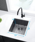 Stainless Steel Single Bowl Outdoor Bar Sink With Undermount Workstation Perfect For Your Outdoor Bar Setup And Prep Station Includes Strainer Waste Basket And Bottom Grid 17 x 19 x 9 Inches Black Finish, installed in countertop with black faucet.