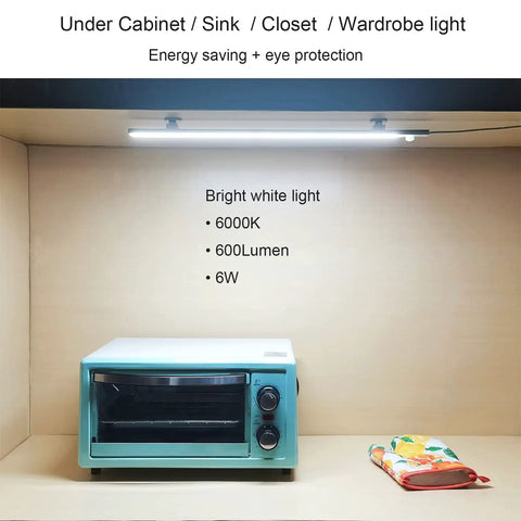 LED Motion Sensor Under Cabinet Lighting Dope 17 Inch USB Plug In Closet Light Bar illuminating a kitchen counter in cool white 6000K.