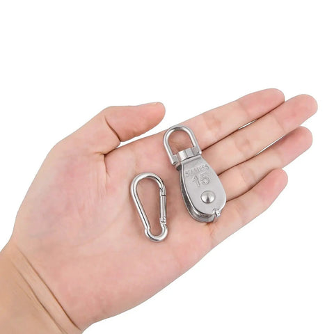 Hand holding 10Pcs M15 Single Pulley Block Set in 304 Stainless Steel With Wire Rope Hanging Wheel And 10 Spring Snap Hooks