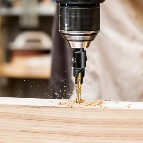 Close-up of Four Piece Diy Woodworking Countersink Drill Bit Set With One Quarter Inch Hex Shank in use on wood