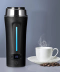 Global Travel Kettle With Dual Voltage 110-240V Portable Electric Kettle LCD Display next to a steaming white coffee cup
