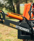 Close-up of Fronthoe Excavator Attachment For Skid Steer, 6 Ft Reach, 3000 PSI Hydraulic Cylinder, SSQA Quick Tach arm.