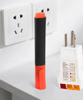 Grounding Tester Kit Conductivity Pen And Outlet Continuity Tester on table with US standard outlet in background.