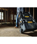 Rugged ToughSystem Tool Box With Pull Back Lid for maximum storage being transported on worksite, telescopic handle visible