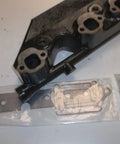 Exhaust Manifold Riser Elbow Kit For GM 4.3L Volvo Penta Marine Engines, showing cast iron parts, gaskets, and bolts