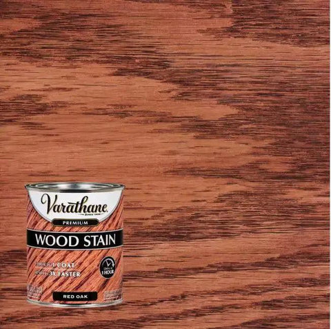 Heavy Duty Interior Wood Stain Delivers A Knockout Red Oak Tone On Cabinets And Furniture While Offering Smooth One Coat Coverage That Does The Heavy Lifting And Locks Raw Wood Grain In One Quart with red oak can on wood background.