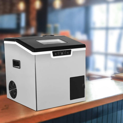 2 in 1 Countertop Ice Maker Crushed Ice and Cube Options Serving Chill with Rock Solid Stainless Steel Build displayed on a bar counter.