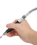 Hand holding a compact pneumatic pencil die grinder, featuring a 1/8 inch shank for swift metal shaping tasks.