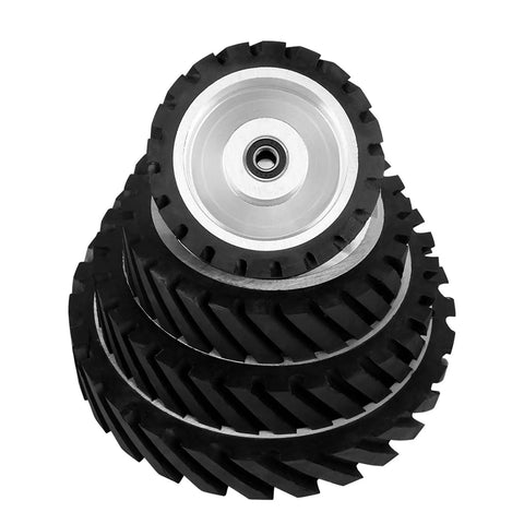 Stack of 10x2 Inch Serrated Rubber Contact Wheel For Belt Grinder And Polishing Machine Rugged Pro Grade Wheel With 7R8 Bearing showing grit