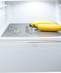 Heavy Metal Replacement Hinges For Commercial Fridge And Freezer Doors on a fridge shelf with bananas.