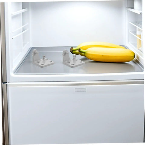 Heavy Metal Replacement Hinges For Commercial Fridge And Freezer Doors on a fridge shelf with bananas.