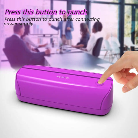 Electric 3 Hole Paper Punch With Adapter 20 Sheet Capacity AC Or Battery Powered Purple Office School Studio Tool in use