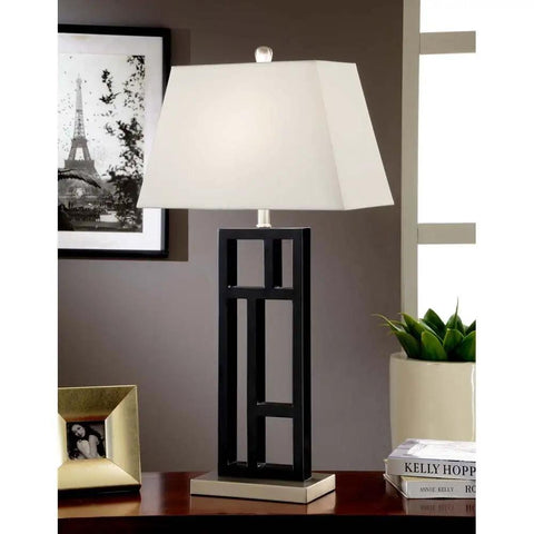 Geometric Sculptured Metal Table Lamp In Sleek Black With Brushed Steel Base And Off White Empire Shade Dope Modern 31 Inch Tall Lighting Fixture For Living Room Or Office Bold Contemporary Accent on a Wooden Table