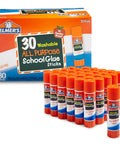 All Purpose School Glue Sticks, Washable And Clear, 7 g Each, 30 Count, box and arranged glue sticks display