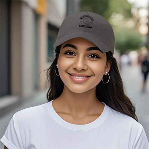 New Orleans Inspired Dark Grey Adjustable Cap For Men With One Size Fits Most Comfy Buckle Closure, worn on a woman's head