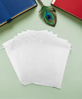Stack of White Organza Gift Bags 100 Pack Drawstring Candy Bags For Party Favors And Wedding Decor Clear Sheer Mesh