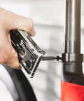 Using Go To All In One Bike Repair Tool With Tubeless Kit And Chain Breaker on a bike, showing tool application