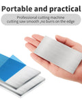 Hand holding aluminum sheet from 36 Piece Aluminum Welding Plates Set For Practice 2 By 4 Inch Sheets 1/8 Inch Thick