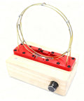 Hands On Perpetual Motion Science Kit With Electromagnetic Cyclotron And Iron Ball Circular Motion Demonstrator Magnetic Drive Tech For STEM Education Red Color Edition, wooden base with metallic loop in focus