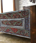Floral Carved Barn Wood Door 71x34 Inch Rustic Farmhouse Entry Pantry Door Double Or Single Sliding Door No Glass No Hardware Ideal For Headboard Wall Art Decor, used as a headboard in a rustic bedroom setting.