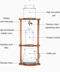 Game Changer Cold Brew Drip Tower With Adjustable Flow Control showcases glass and wood construction, ideal for iced coffee brewing.