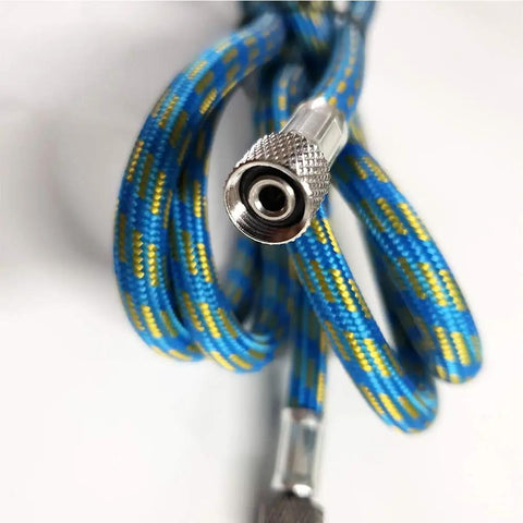 Close-up of Six Foot Nylon Braided Airbrush Hose With 1/8 Inch To 1/4 Inch Adapters For Airbrush Kits, showing adapter end.