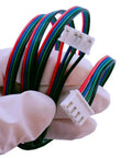 4 Pack 1 Meter 4Pin To 6Pin Stepper Motor Cables For 3D Printers, XH2.54 To PH2.0 Connectors held in gloved hand