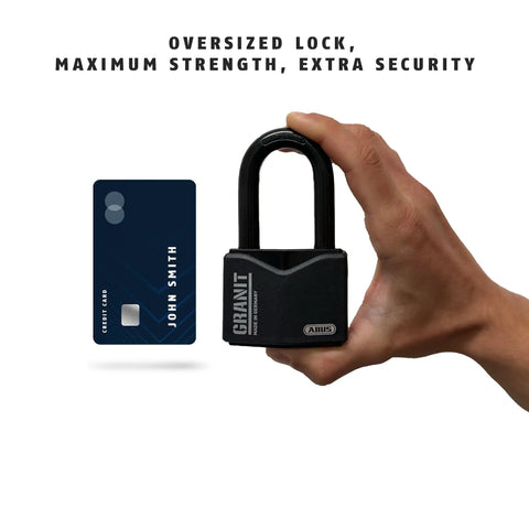 Hand holding Granit Alloy Steel Padlock with 2 Inch Shackle, Keyed Alike, next to credit card for size comparison