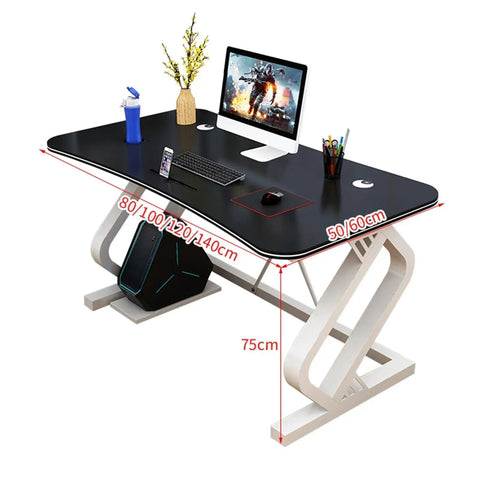 Game Ready Multifunctional Computer Desk With Built In Phone And Drink Slots Curved Gaming Table featuring a modern matte black surface and desk accessories.