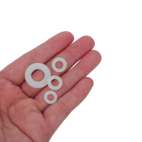 Nylon Flat Washers Assortment Kit 500 Pcs In Sizes M2 M2.5 M3 M4 M5 M6 M8 For All Your Furniture Mounting And Insulation Needs Easy To Install And Corrosion Resistant, white nylon washers in hand