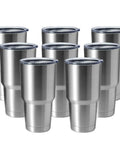 Hardcore 30oz Stainless Steel Tumbler Featuring Double Wall Vacuum Insulation That Keeps Your Drink Frosty Or Piping Hot Through Any Hustle A Tough Grab And Go Travel Coffee Mug Built To Handle Daily Grind With Matte Finish. Multiple stainless steel tumblers arranged in a group.