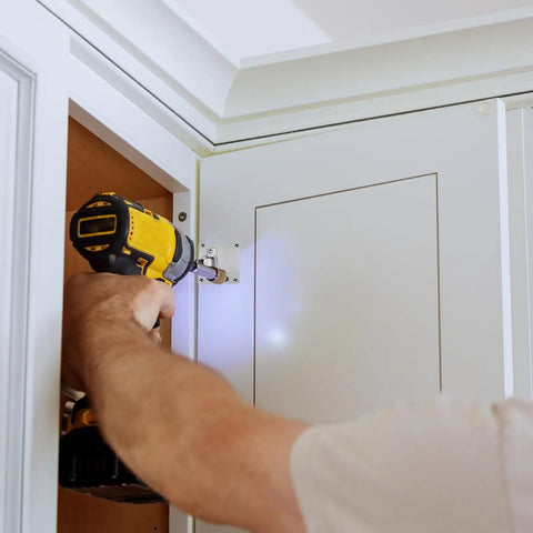 Person installing 2 Pcs 90X90mm Cabinet Hinges Repair Plate Stainless Steel Black For Wooden Doors Kitchen Cupboards And Furniture Built To Last Hinge Repair Brackets With 6 Screws And Easy Install on cabinet