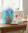 Blue Mother's Day Gift Bag With Tissue Paper Floral Non-Woven Design 10x8x4.7 Inches On Decorated Table