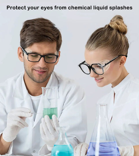 Two lab workers wearing slip on side shields for prescription glasses, examining liquids, showcasing no slip eye protection shields.