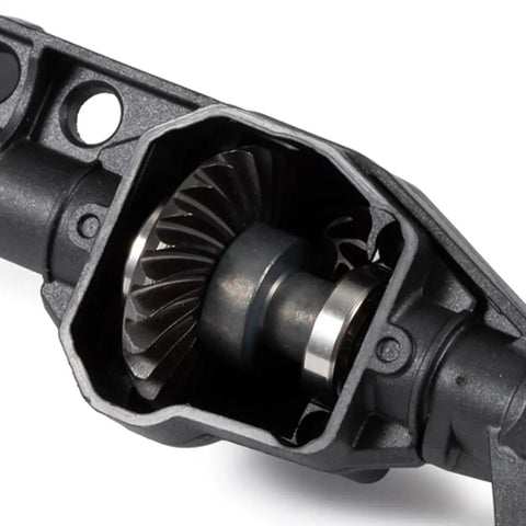 Close-up of Overdrive And Underdrive Helical Axle Gear Set Upgrade for Axial RC Crawlers showing gear teeth detail and housing.