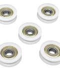 Rock Solid 5 Pack Nylon Pulley Wheels With Quiet Ball Bearings For U Groove Tracks, five white wheels with metal bearings.