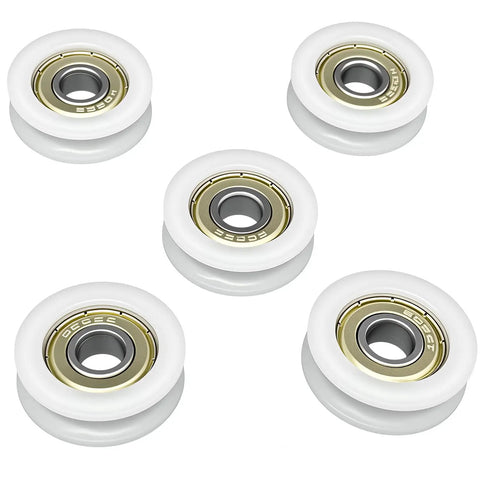 Rock Solid 5 Pack Nylon Pulley Wheels With Quiet Ball Bearings For U Groove Tracks, five white wheels with metal bearings.