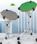 Youeon Heavy Duty Double Braced Snare Drum Stand With Stick Holder Fits 10 14 Inch Kicks Adjustable Height For Beginners And Pros Alike, showing green and grey hexagonal pads.