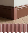 Self Adhesive Rubber Corner Protectors For Walls And Furniture, Brown Baseboard Edge Guards installed on wall corner, 8 pcs shown