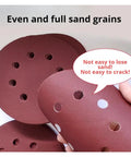 Super Tough 50 Pack Sanding Discs With Fast Hook Loop Change For Woodworking Metal Polishing Aluminum Oxide Abrasive Paper showing even sand grains and holes.