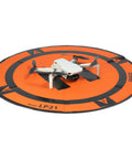 Weighted Trifold UAV Drone Landing Pad LP21 with drone, bright orange design, no stakes, fits Mini 4 Pro, Mini 3 Pro, Mavic Spark.