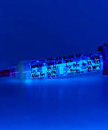 No Clean Tacky Flux For Hand Soldering Tin Lead ROL0, 10g Syringe Kit under blue light showing details on the product label.