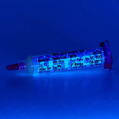 No Clean Tacky Flux For Hand Soldering Tin Lead ROL0, 10g Syringe Kit under blue light showing details on the product label.