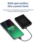 Handheld Mini Spot Welder Kit For DIY Projects showing charging functionality with smartphone connection.
